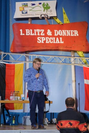 Philipp Aff calling on stage